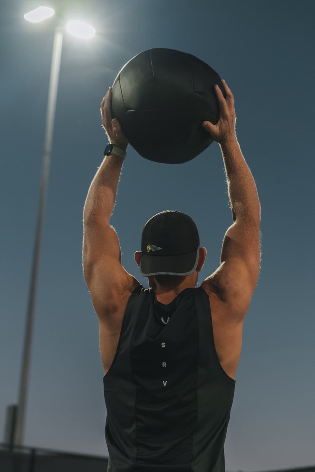 Fit4Tennis athlete training with a medicine ball